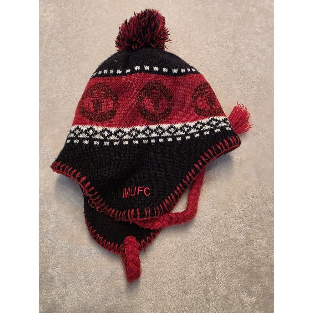 Manchester United Football Club winter hat with a pom-pom, featuring the team...